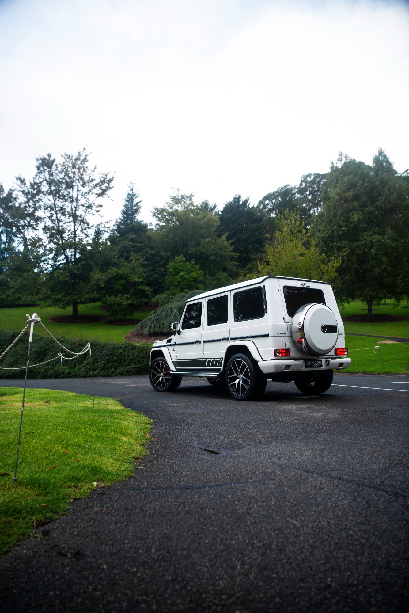 White G-Wagon on the driveway of a country estate